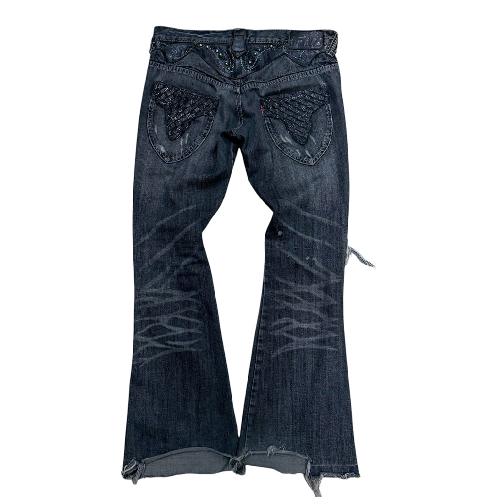 TORNADO MART BLACK STUDDED JEANS.