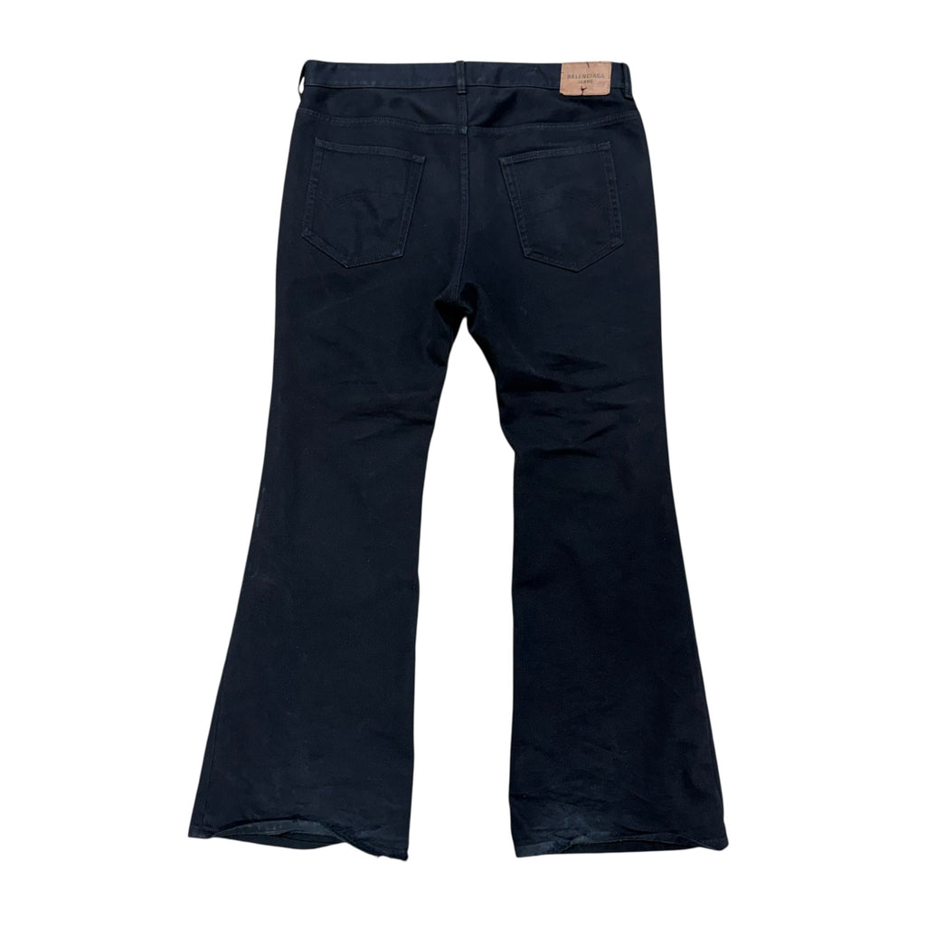 BALENCIAGA BLACK FLARED DENIMS.