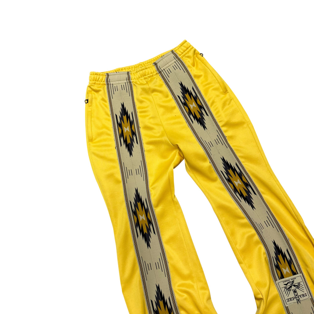 KAPITAL YELLOW SMOOTH JERSEY TRACK PANTS.