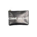 COMME DES GARCONS LEATHER POUCH.