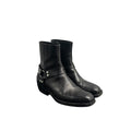 CELINE LEATHER HARNESS BOOTS.
