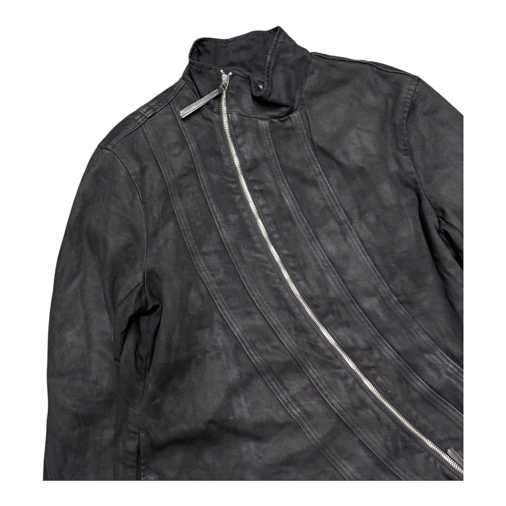 TROUBLED WATERS ASYMMETRICAL WAXED JACKET.