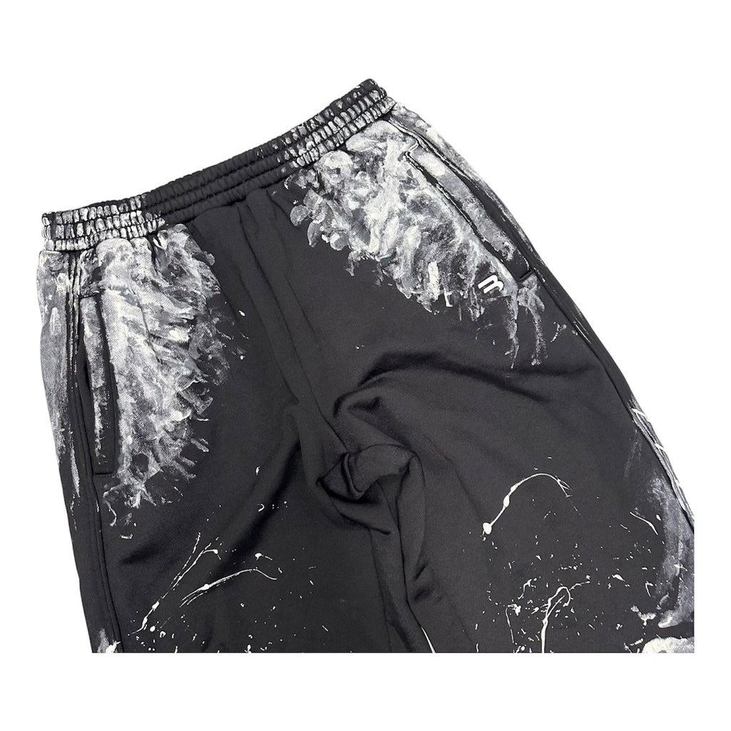 BALENCIAGA PAINT SPLATTER SWEATPANTS.