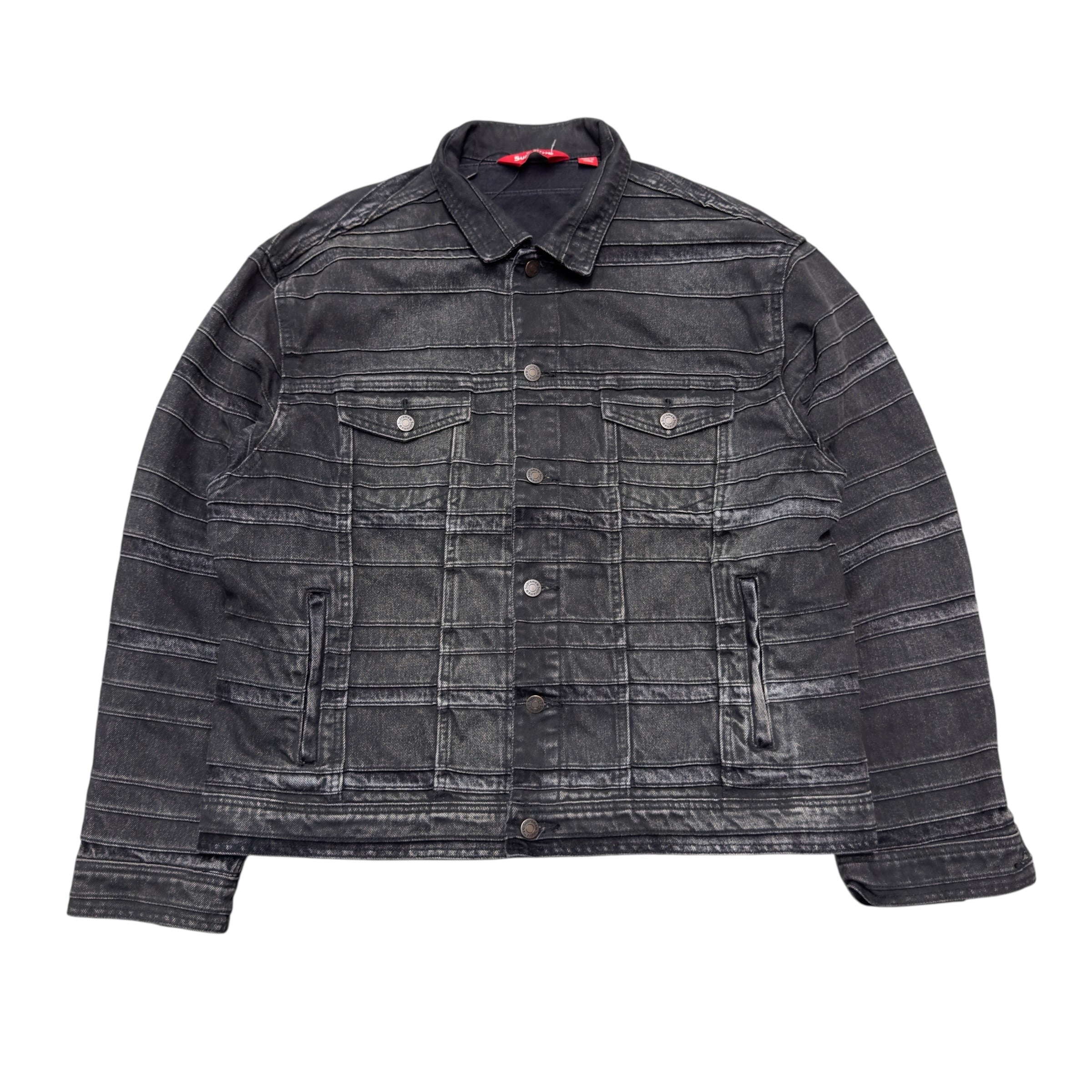 SUPREME LAYERED DENIM TRUCKER JACKET.