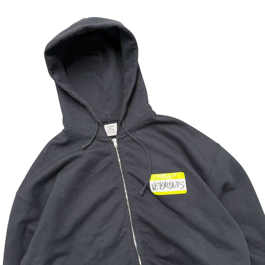 VETEMENT NAMETAG ZIP UP HOODIE.
