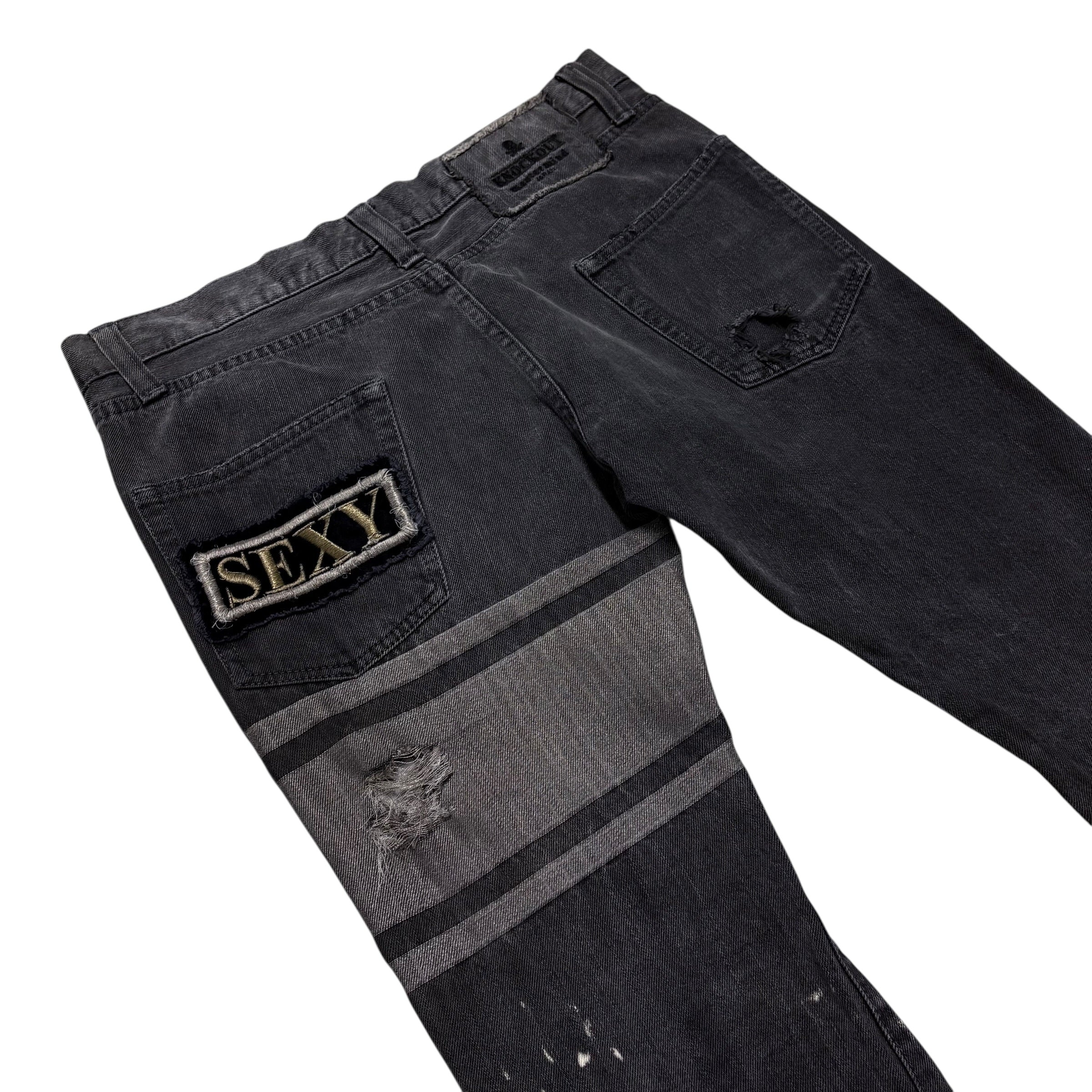 MASTERMIND STRIPED DISTRESSED DENIM.