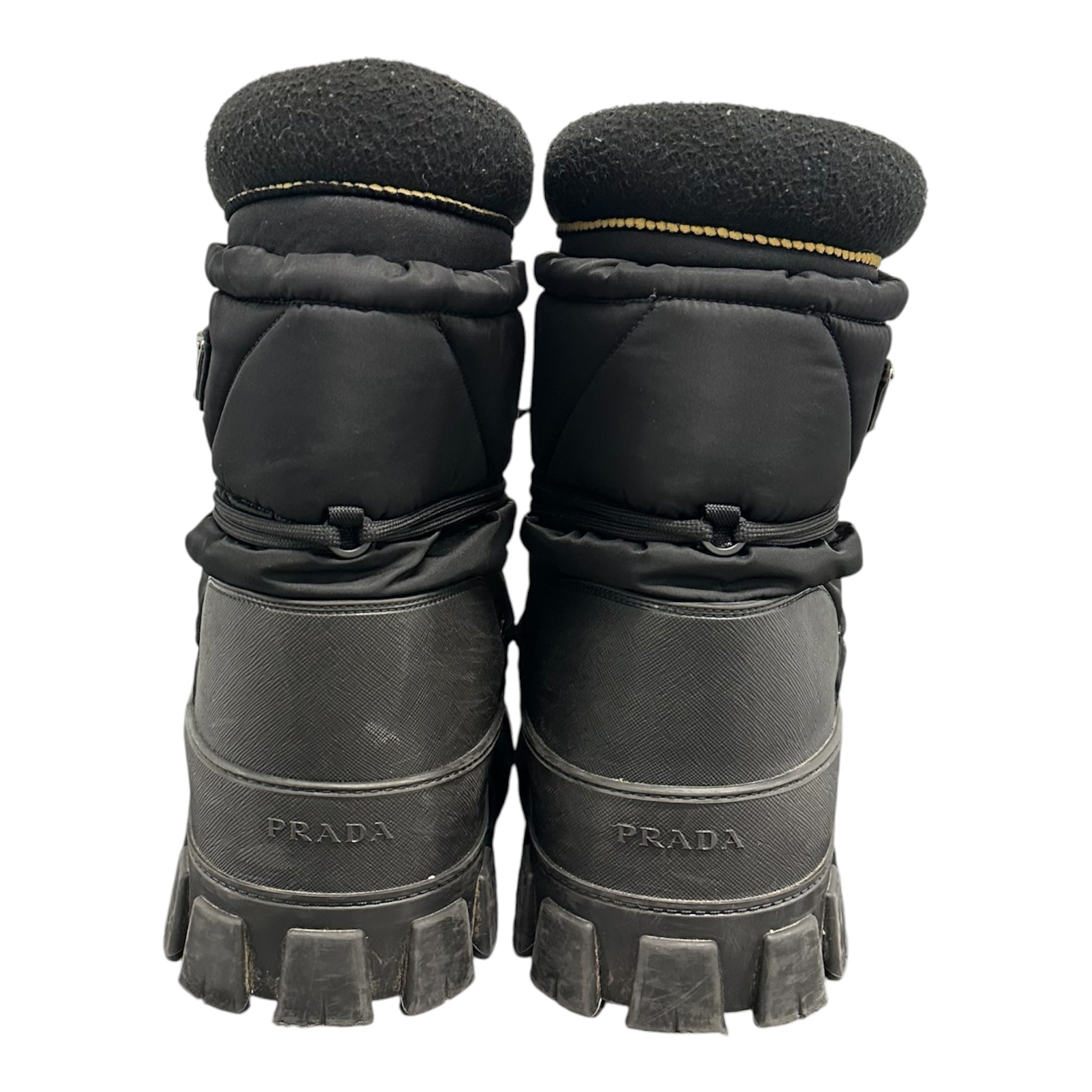 PRADA PADDED MONOLITH APRE SKI BOOTS.