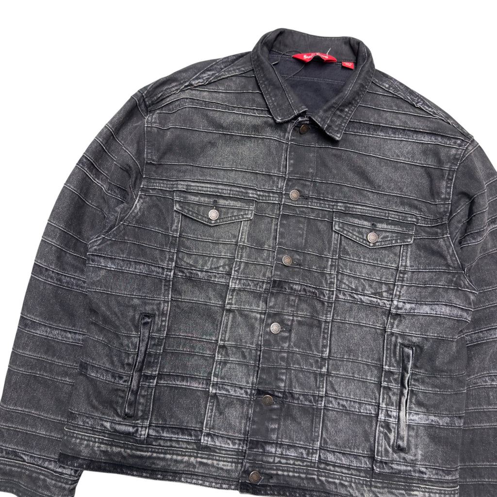SUPREME LAYERED DENIM TRUCKER JACKET.
