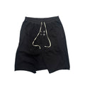 RICK OWENS GIMP DROP CROTCH SHORTS.
