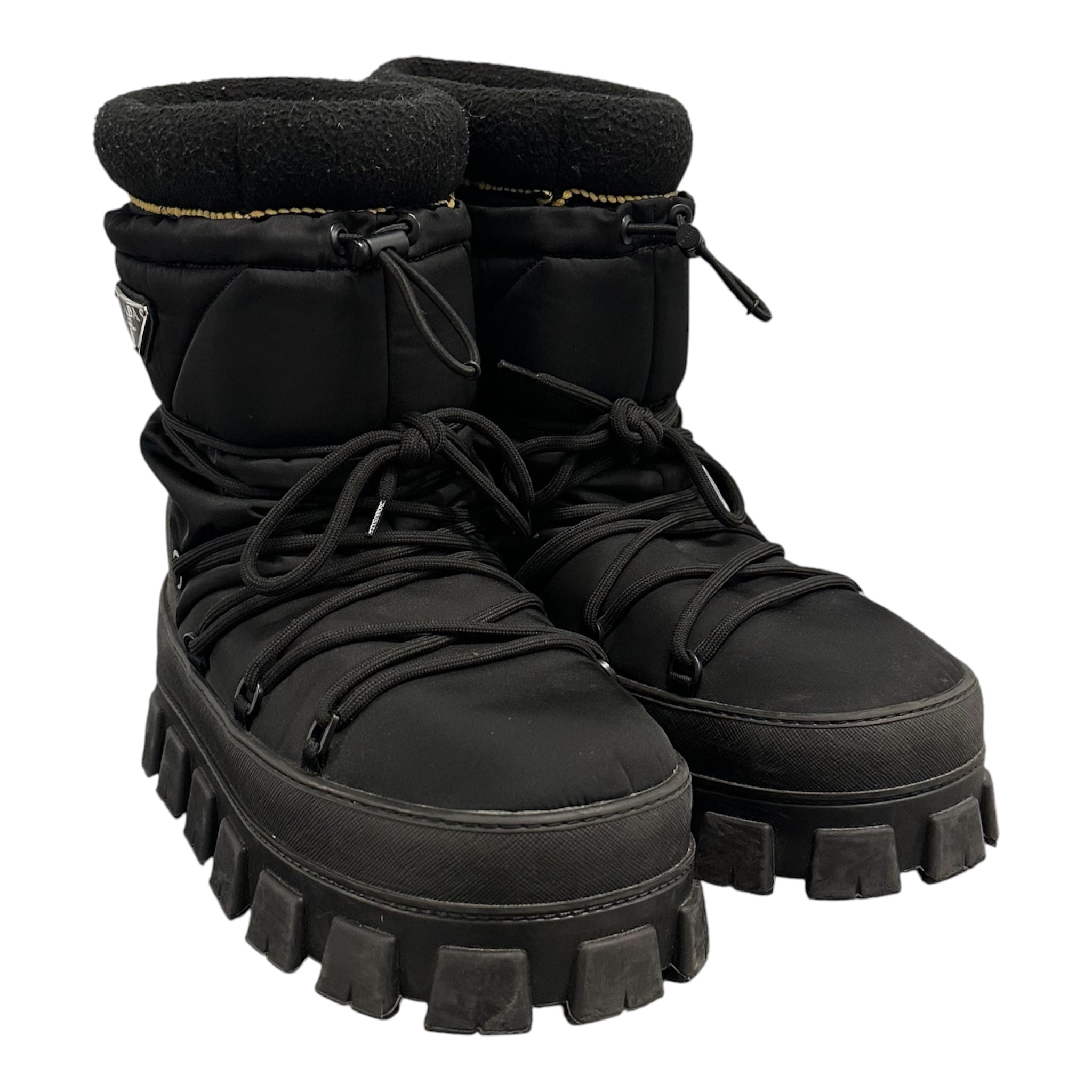 PRADA PADDED MONOLITH APRE SKI BOOTS.