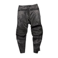 VETEMENTS SS16 REWORKED LEATHER TROUSERS IN BLACK.