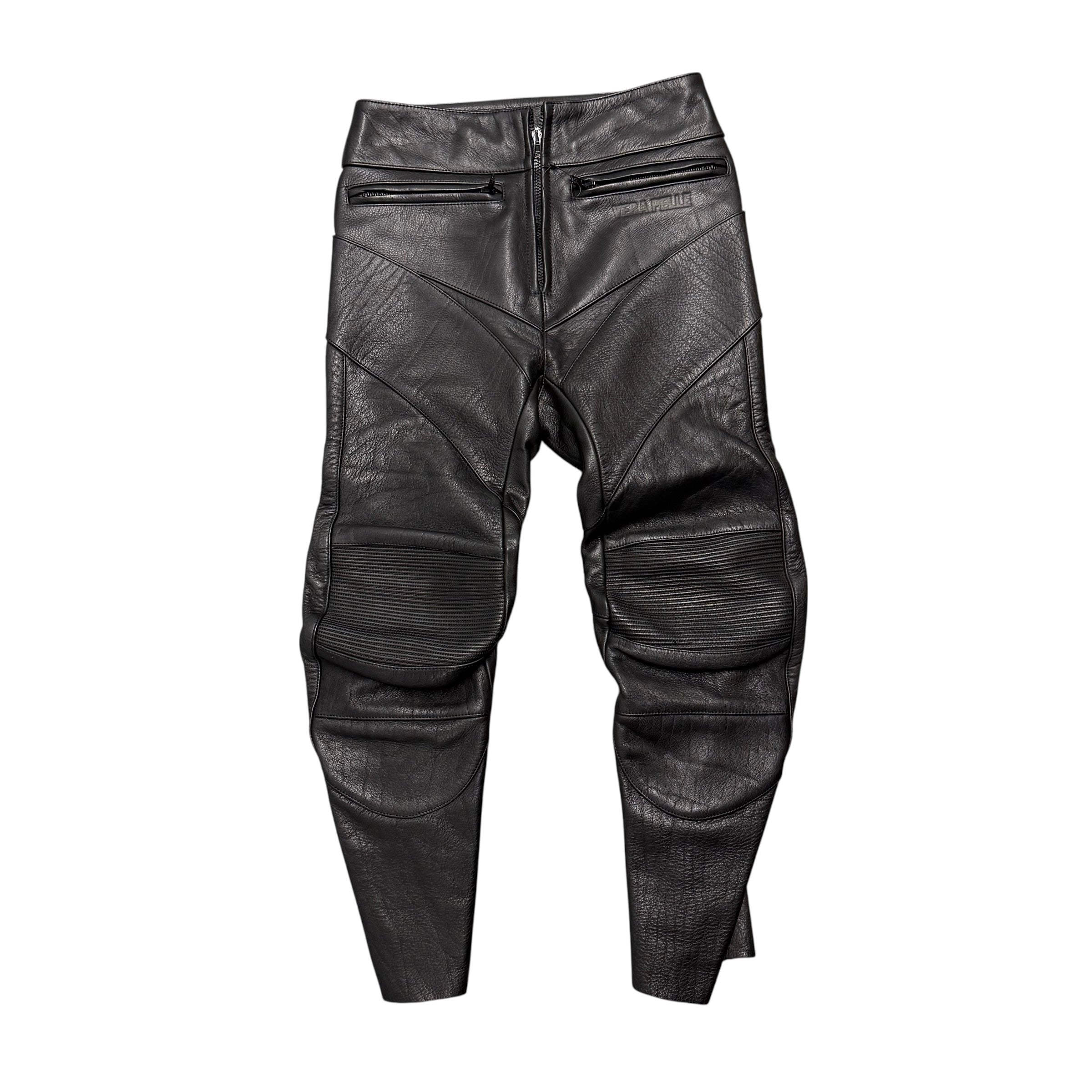 VETEMENTS SS16 REWORKED LEATHER TROUSERS IN BLACK.