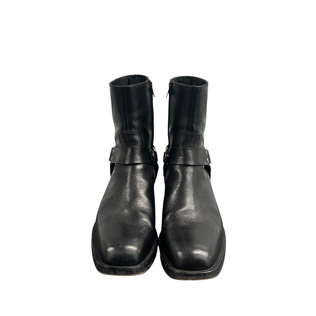 CELINE LEATHER HARNESS BOOTS.