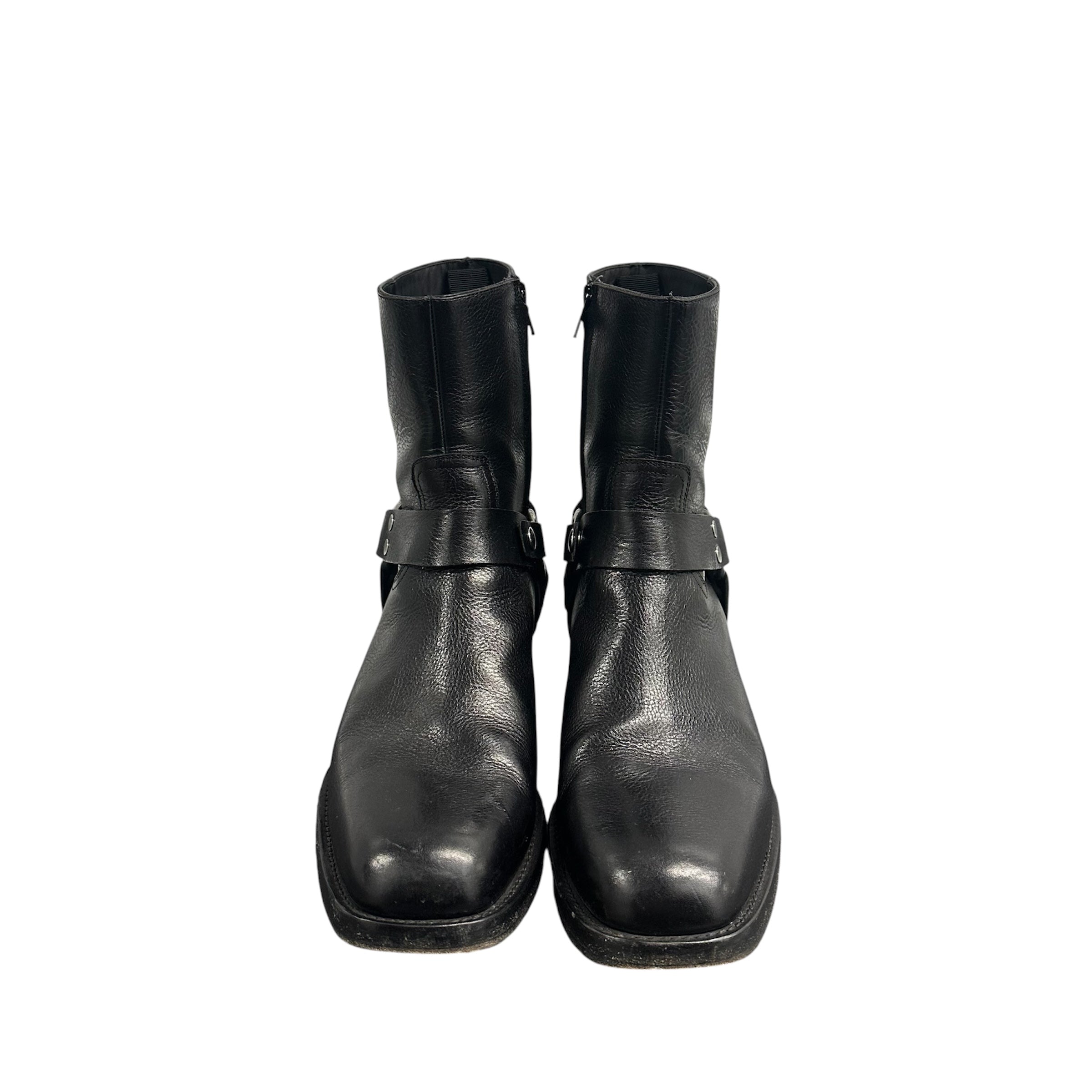 CELINE LEATHER HARNESS BOOTS.