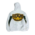 SUPREME STADIUM STUDDED PUFFER JACKET.