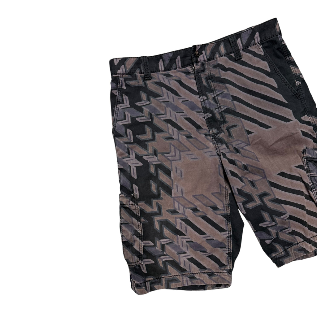 ISSEY MIYAKE BROWN FADED SHORTS.