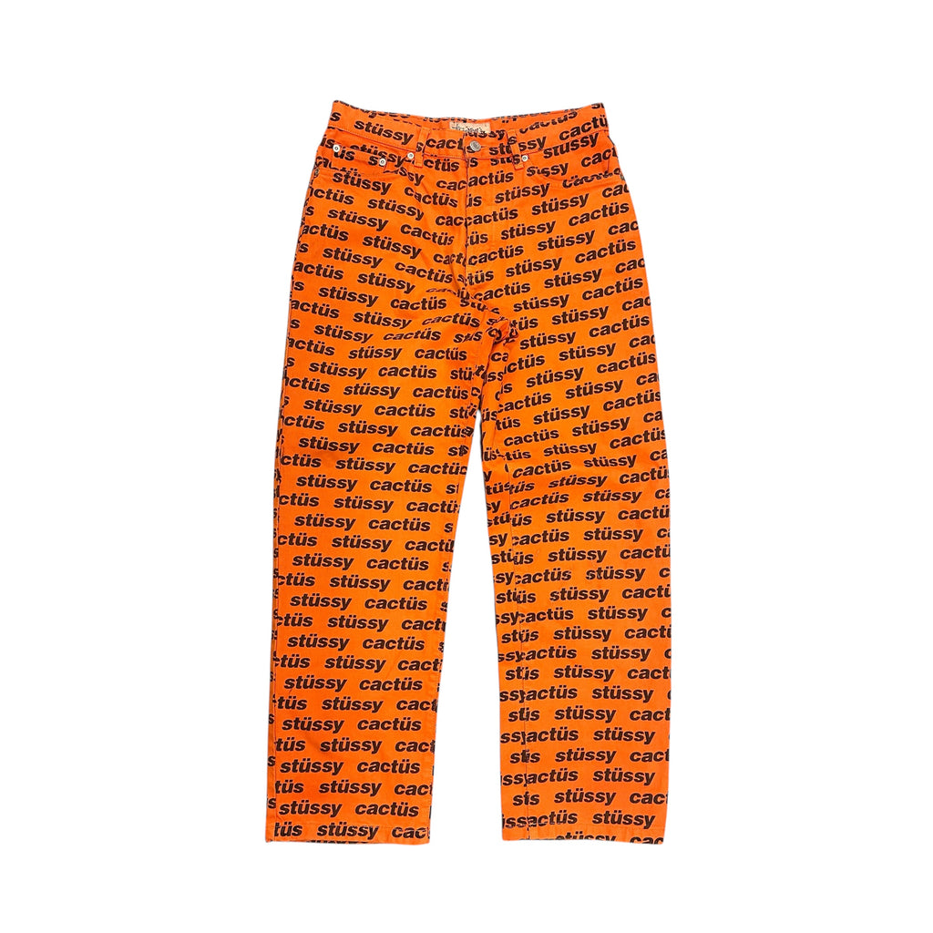 STUSSY X CACTUS JACK FLEA MARKET ORANGE AOP DENIM.