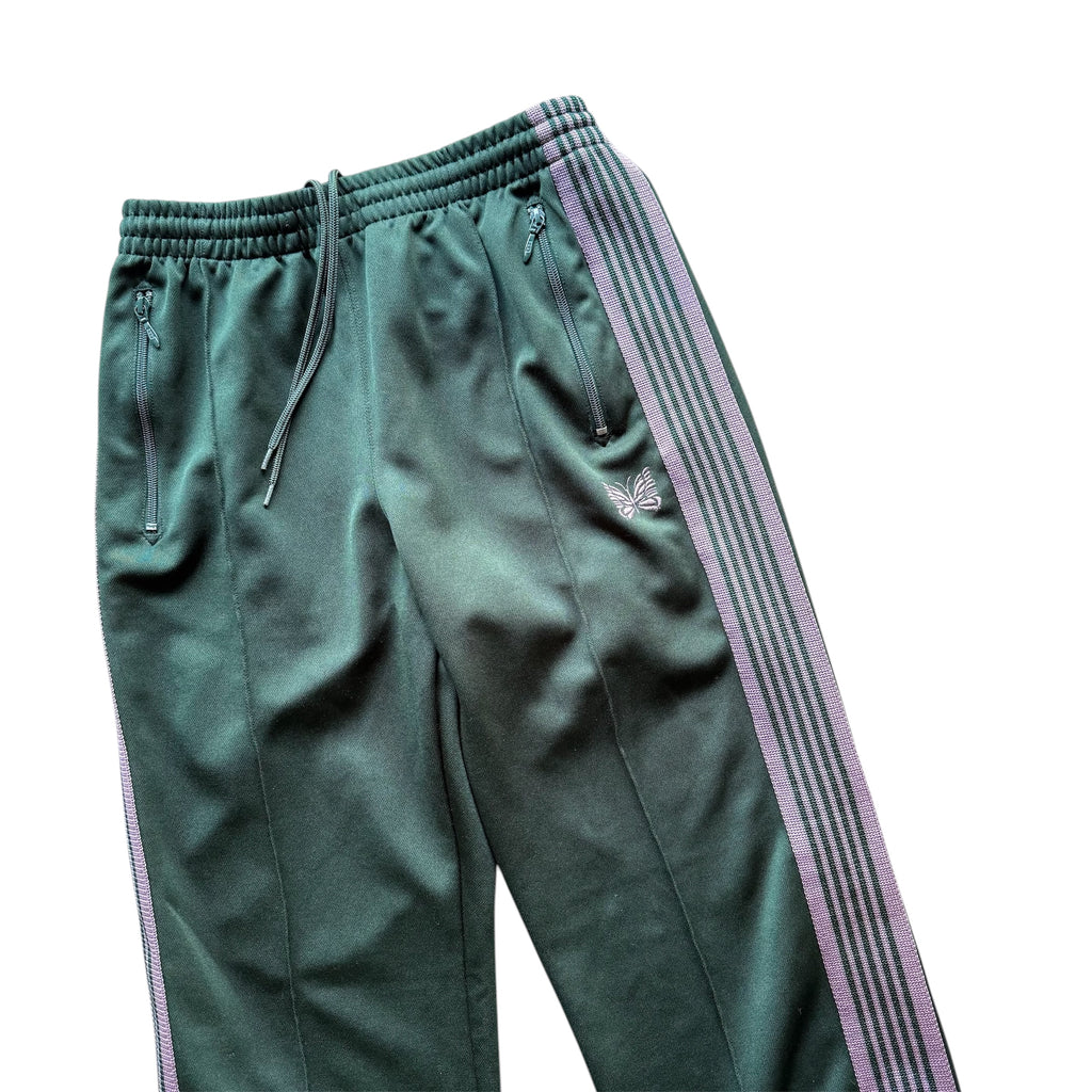 GREEN NEEDLES TRACK PANTS.