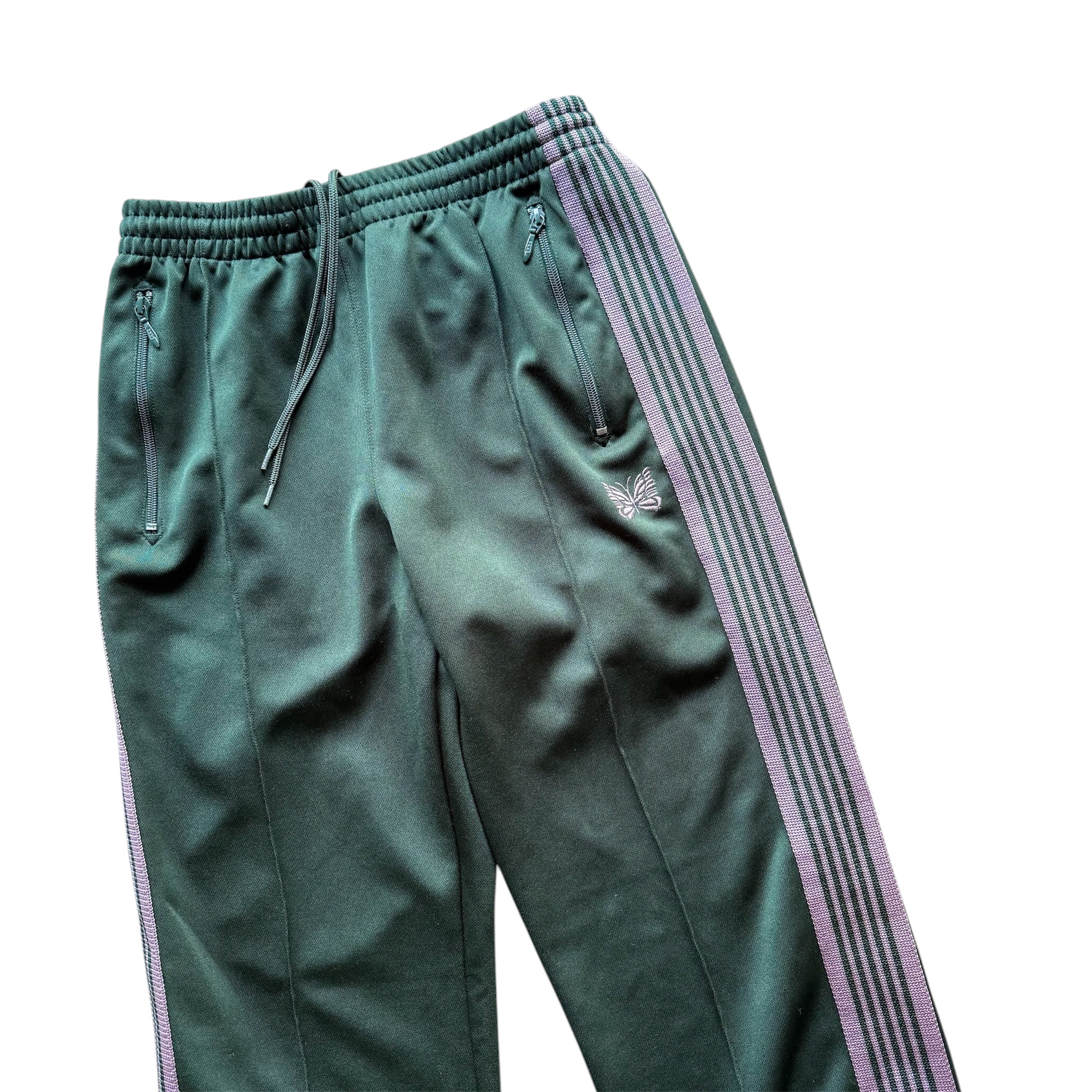 GREEN NEEDLES TRACK PANTS.