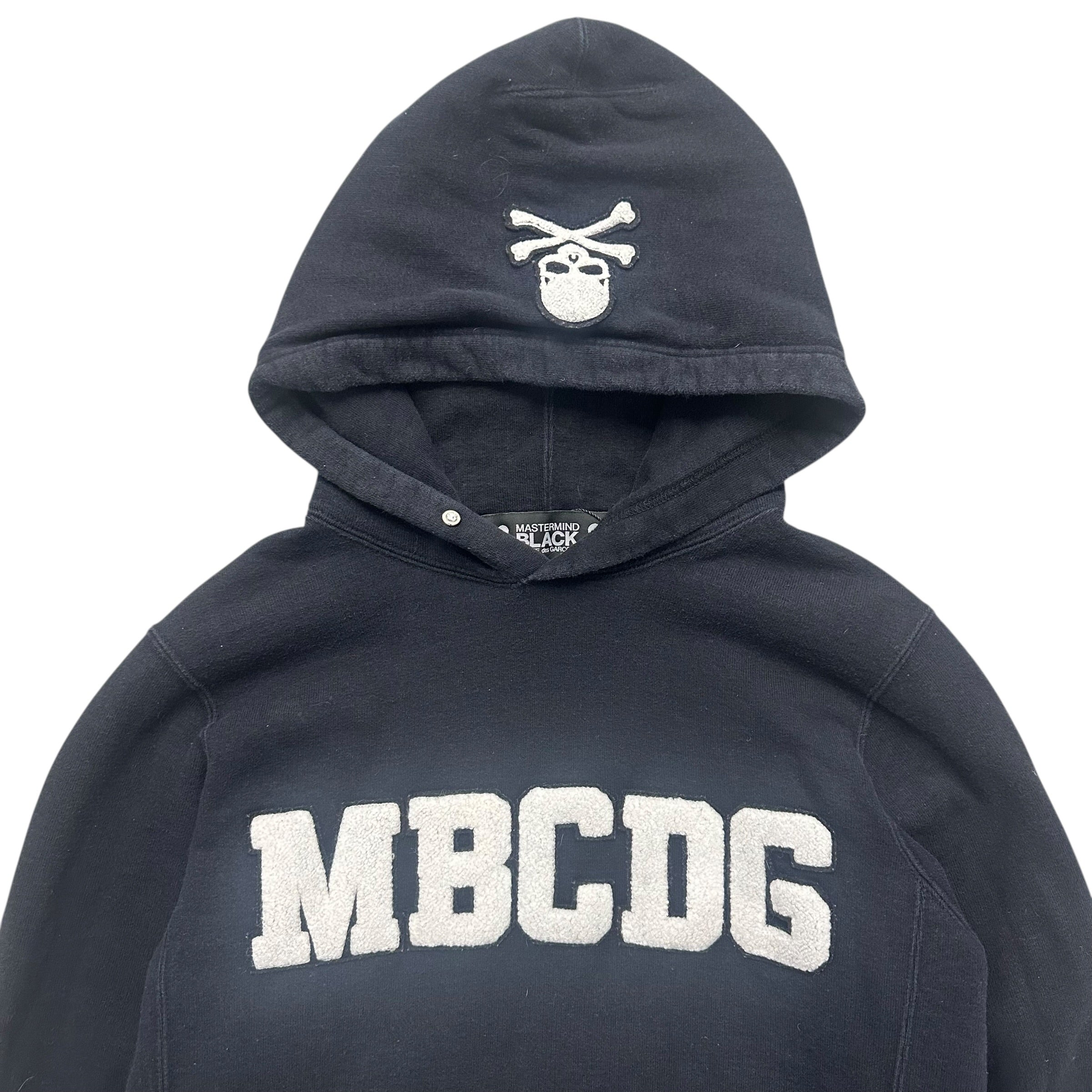 MASTERMIND BLACK COMME DES GARÇONS “MBCDG” HOODIE.