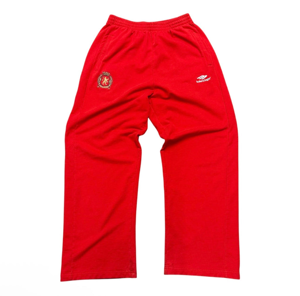 BALENCIAGA RED SOCCER SWEATPANTS.