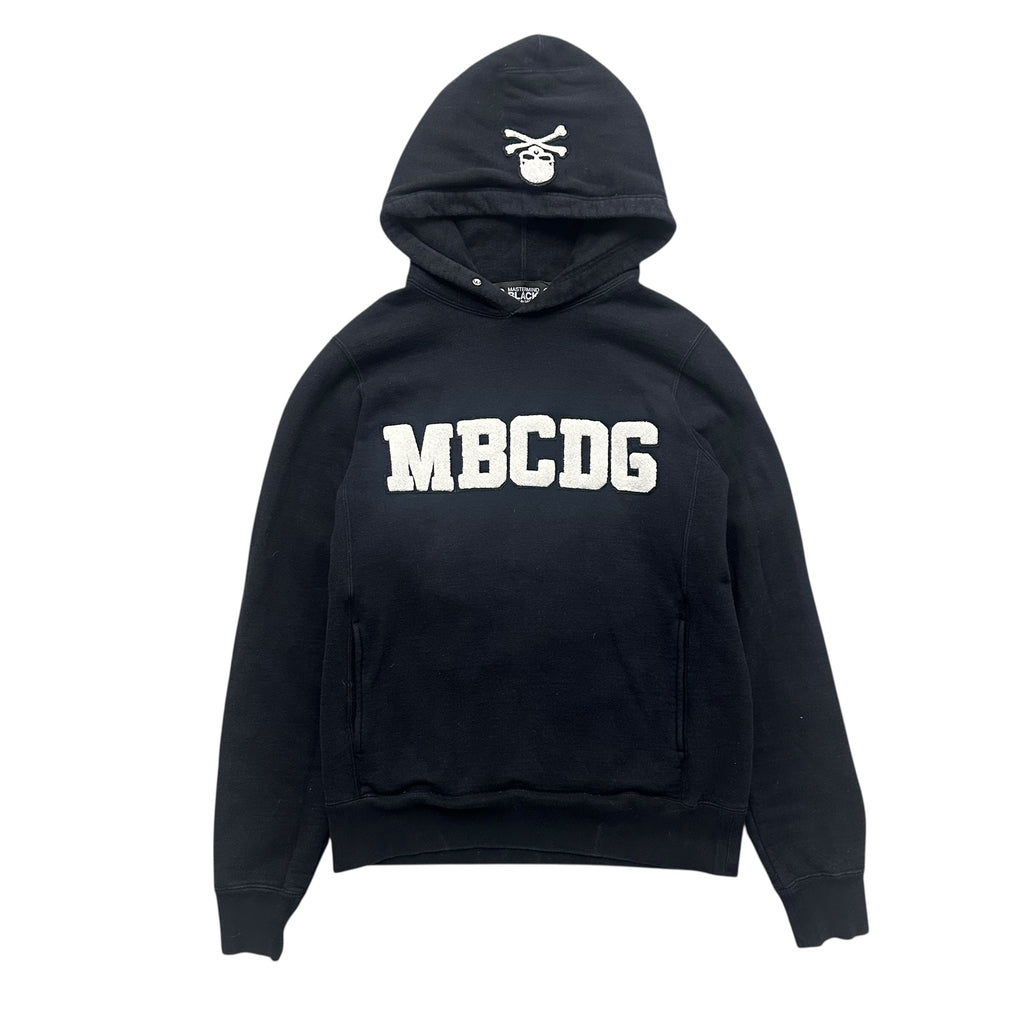 MASTERMIND BLACK COMME DES GARÇONS “MBCDG” HOODIE.
