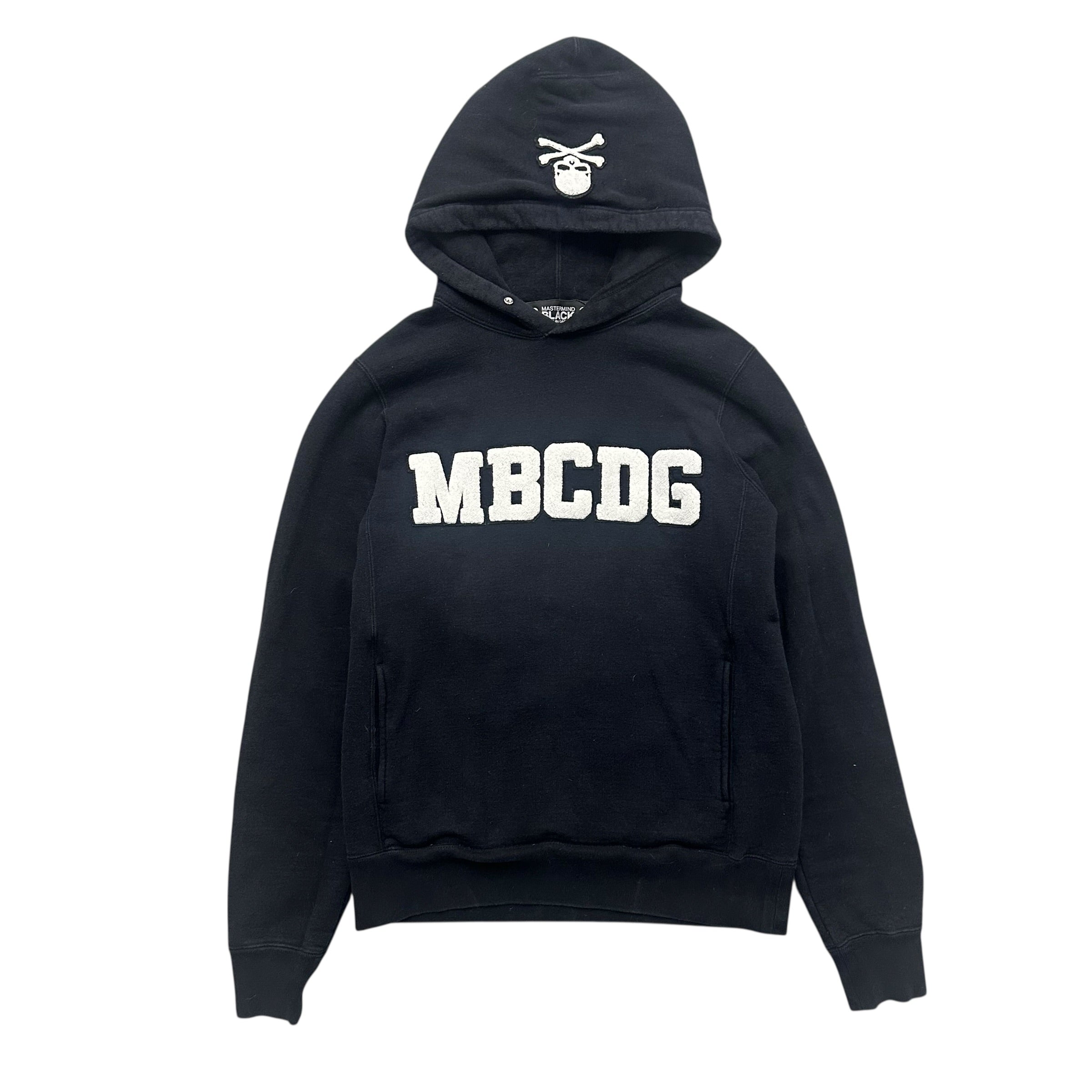 MASTERMIND BLACK COMME DES GARÇONS “MBCDG” HOODIE.