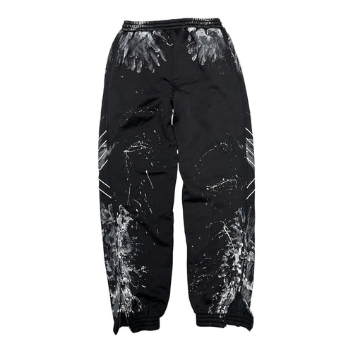 BALENCIAGA PAINT SPLATTER SWEATPANTS.