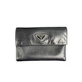PRADA SAFFIANO LEATHER FLAP WALLET.