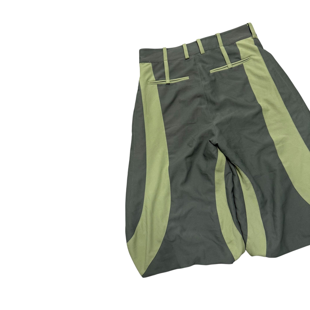 UNCERTAIN FACTOR GREEN LONG SHORTS.
