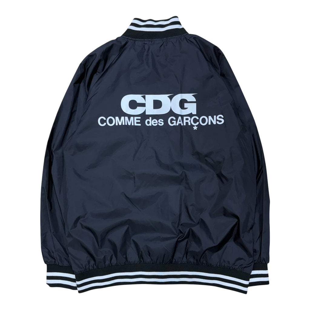 BLACK CDG COACH JACKET.