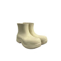 WHITE BOTTEGA VENETA PUDDLE BOOTS.