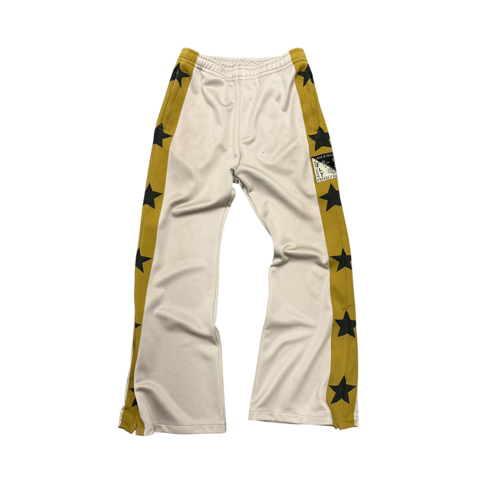 KAPITAL YELLOW & BLACK STAR SWEATPANTS.