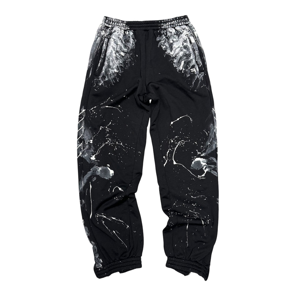 BALENCIAGA PAINT SPLATTER SWEATPANTS.