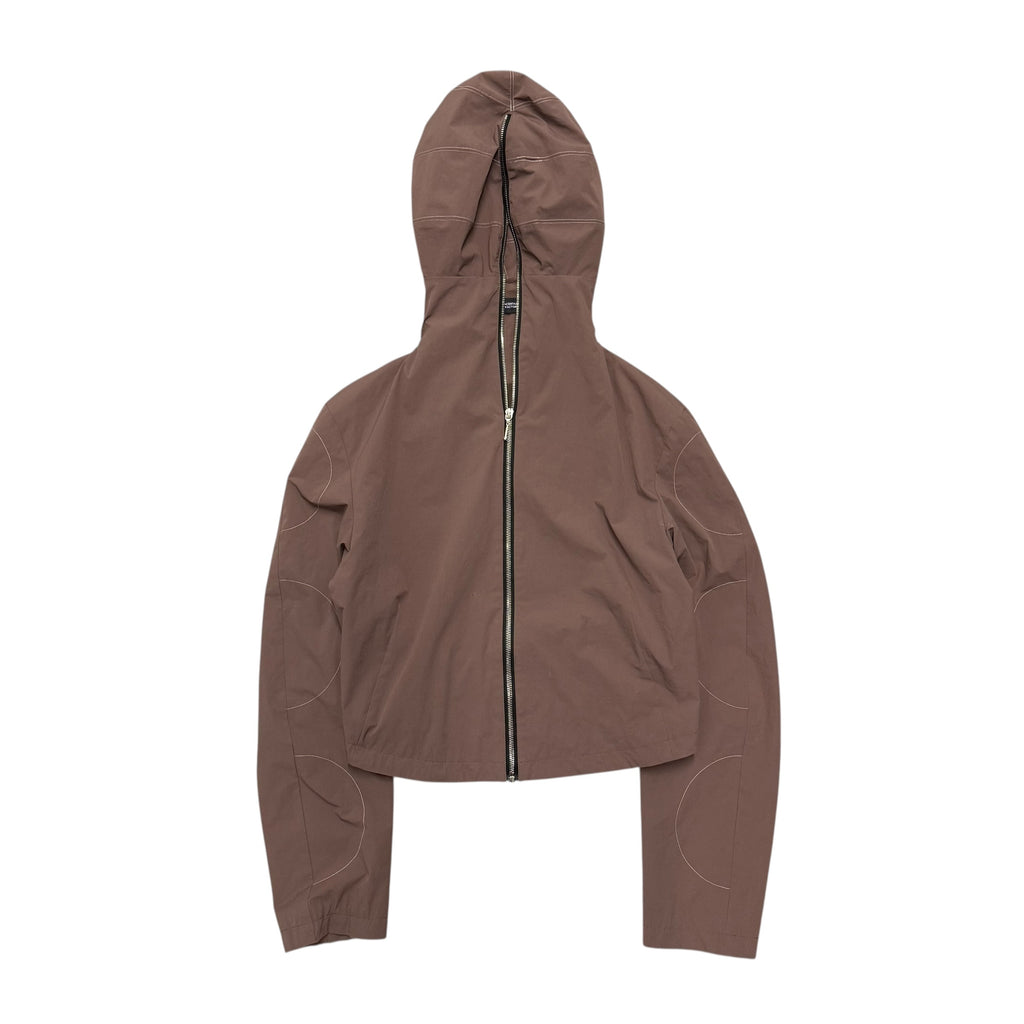 UNCERTAIN FACTOR BROWN ZIP UP NYLON JACKET.