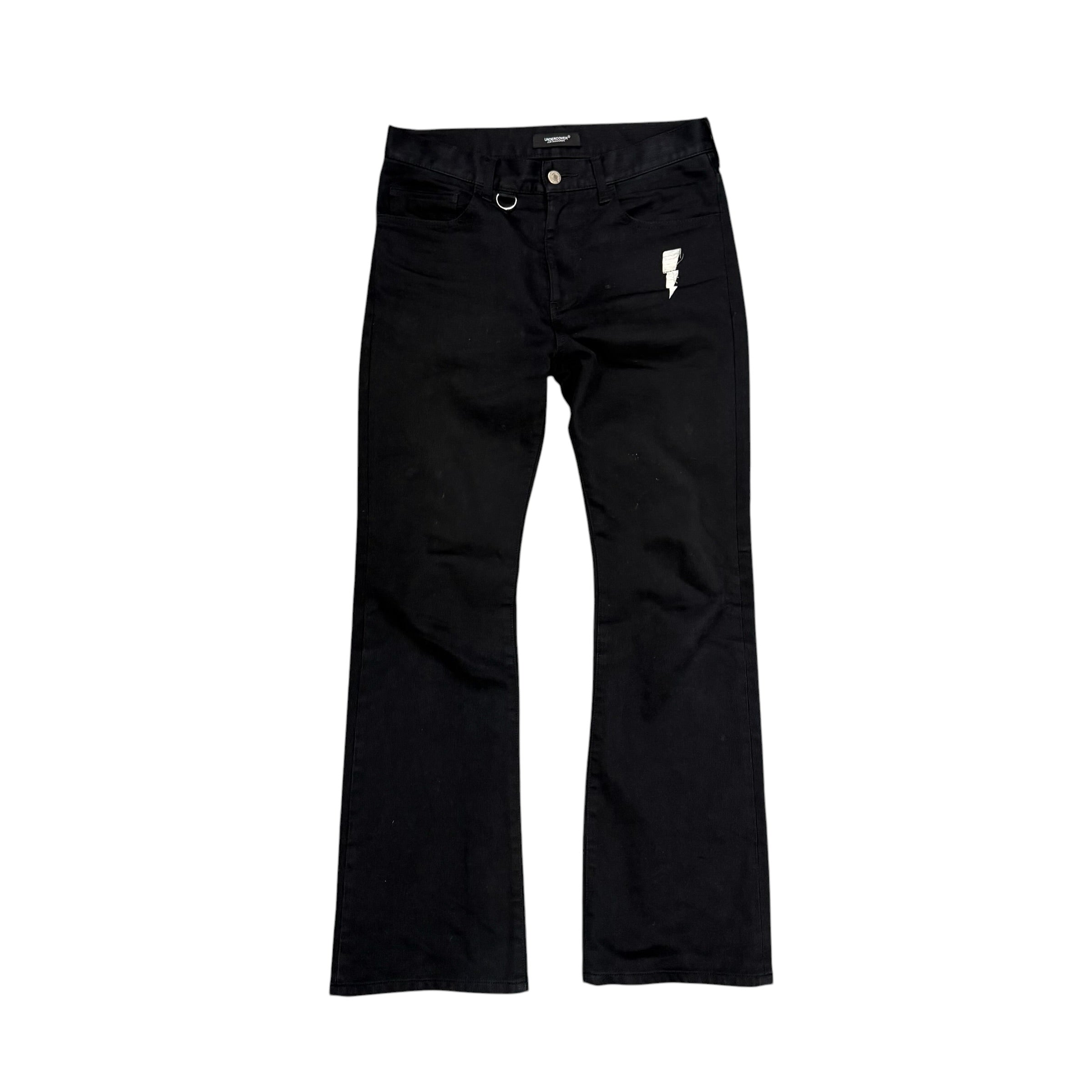 UNDERCOVER FLARED THUNDERBOLT DENIM PANTS.
