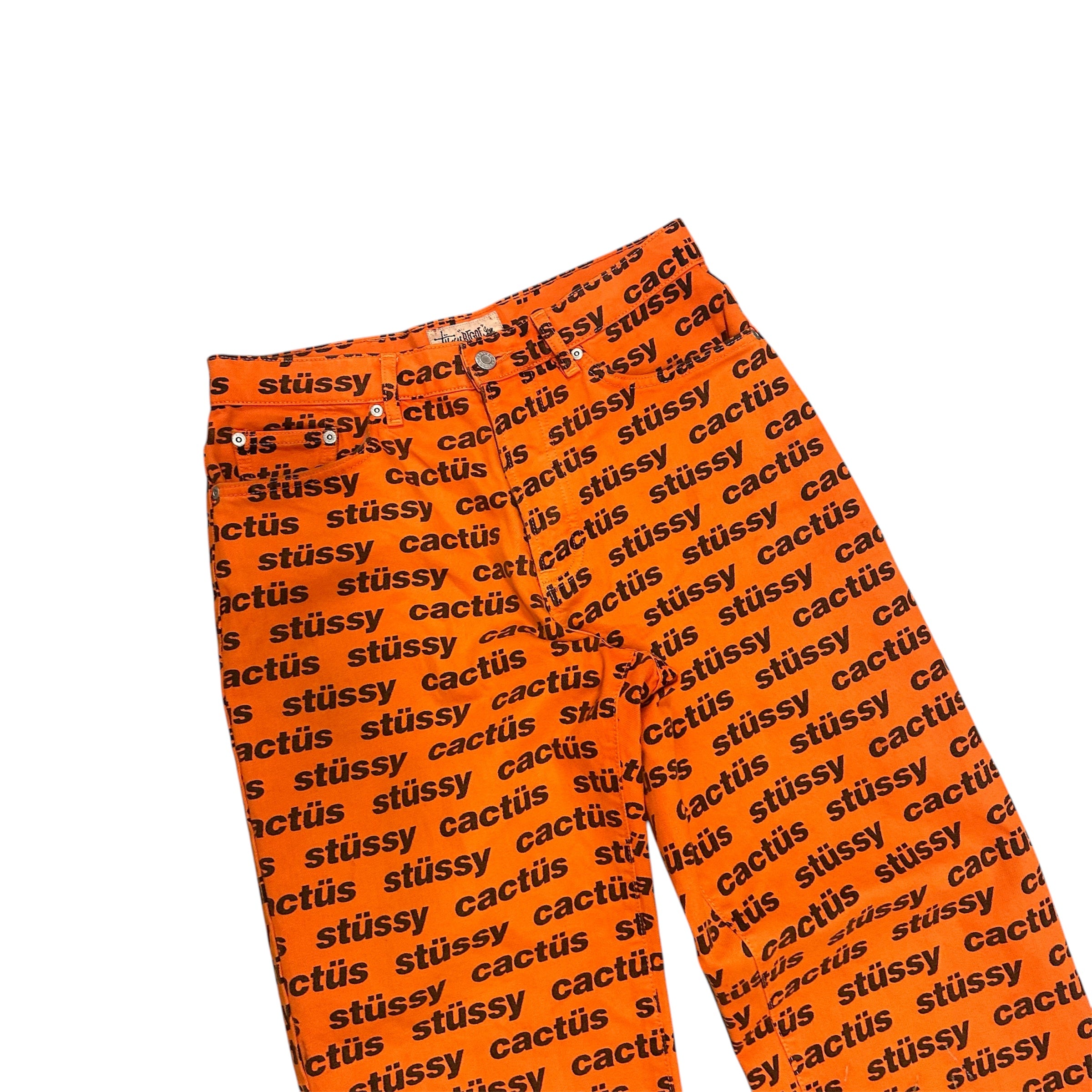 STUSSY X CACTUS JACK FLEA MARKET ORANGE AOP DENIM.